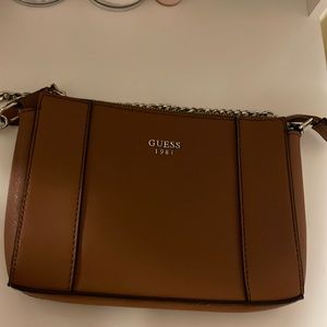 This is a Guess cross body bag barely used!!